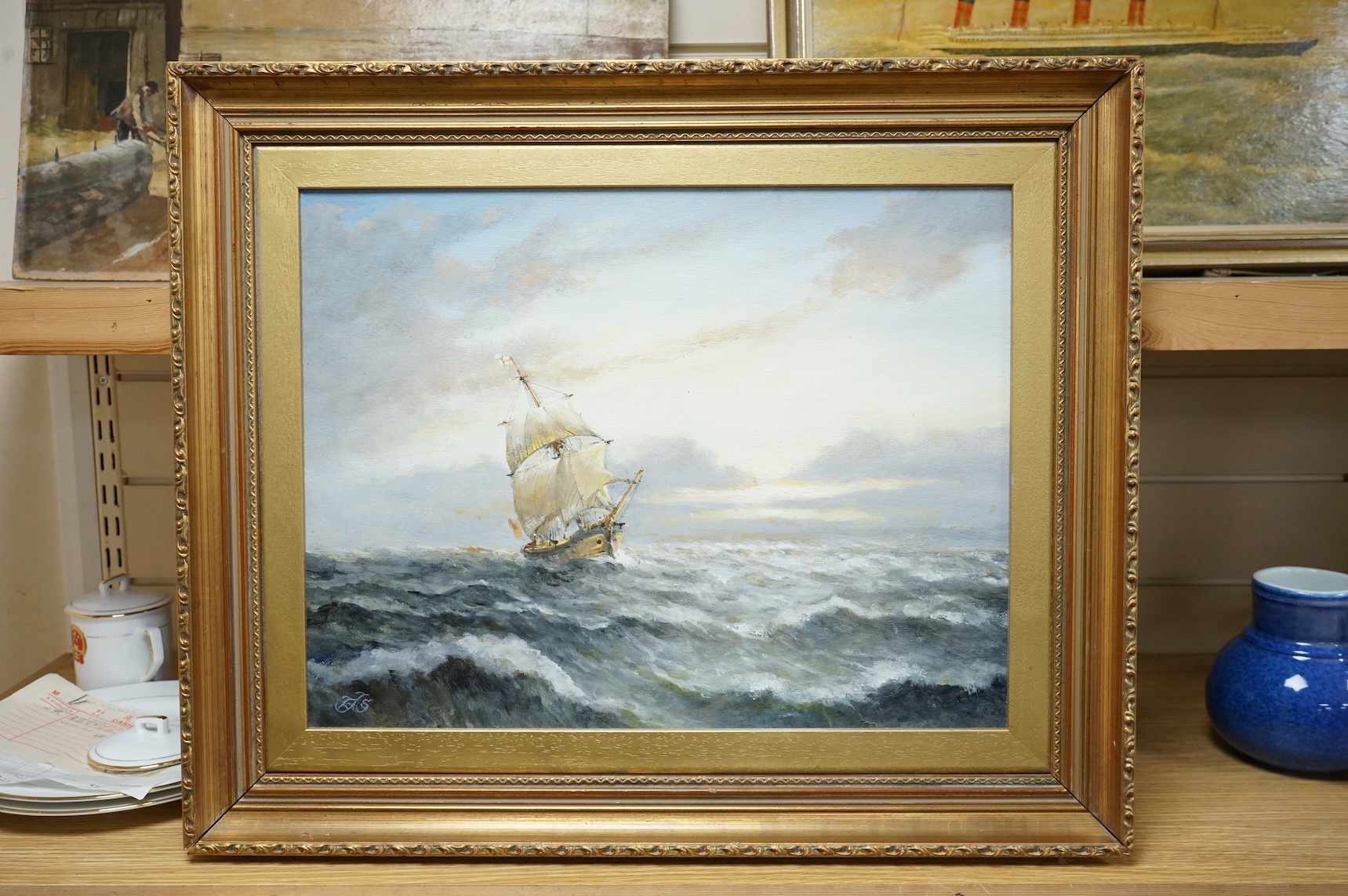 EAS, maritime oil on board, ship at sea, initialled, gilt framed, 34 x 44cm